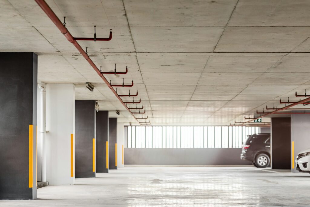 Complete silence. Parking garage interior. Copy space