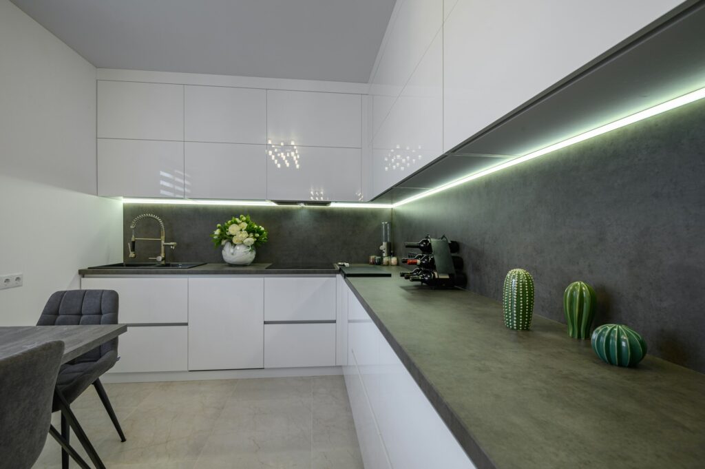 Luxurious white kitchen with granite counter top